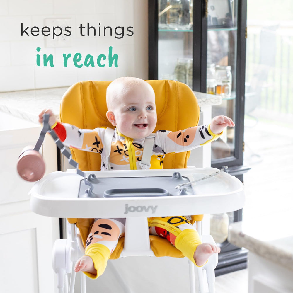 Busy Baby silicone mat secures to highchair trays and glass doors