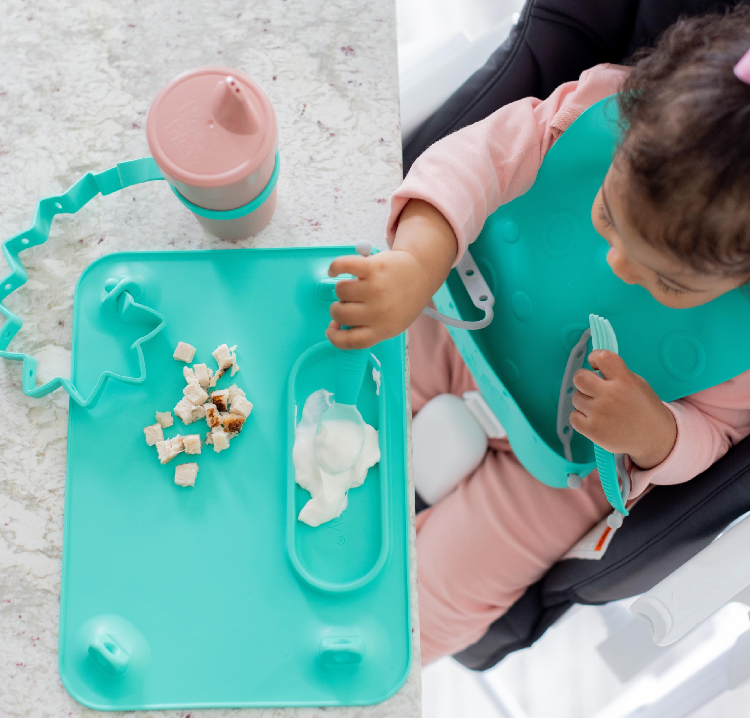 Busy Baby silicone mat textured surface promotes tactile exploration during meals