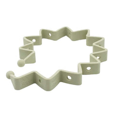 Busy Baby Toy Bungee in tan silicone keeps toys within reach on the mat.