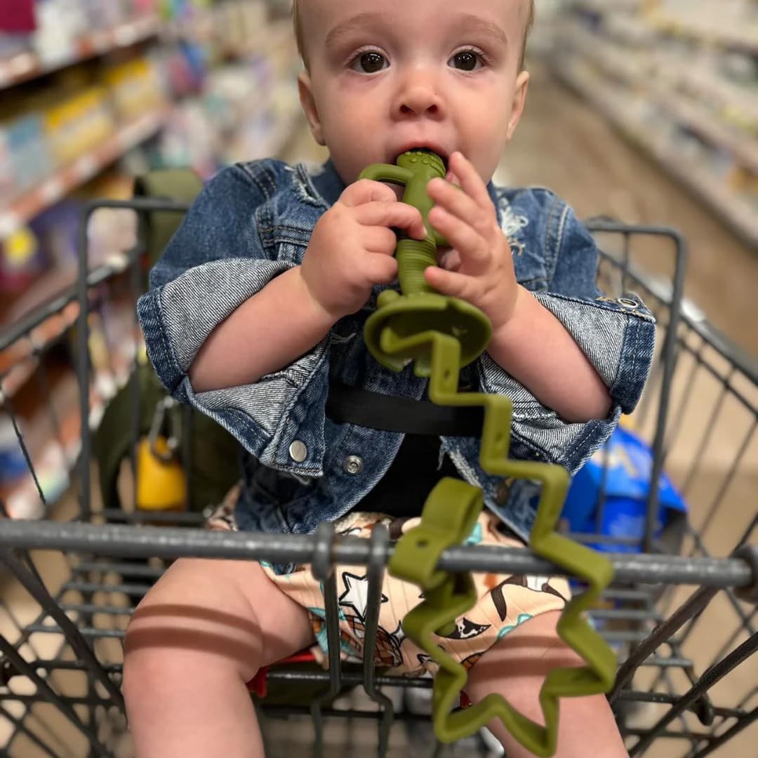 Busy Baby tan silicone bungee helps prevent toy drops during travel.