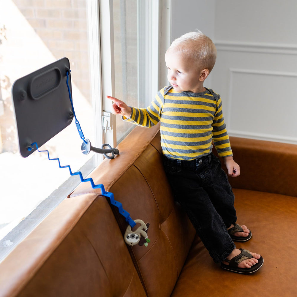 Busy Baby Toy Bungee connects to car seat bars for quick access.