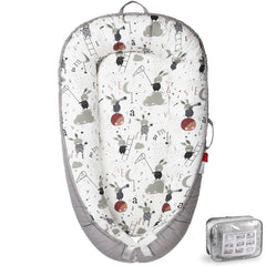 BUTOA baby lounger with breathable cover for comfortable supervised lounging.
