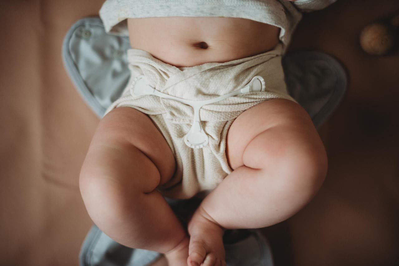 Buttons Diapers Unbleached cotton Birdseye flat, natural fibers suitable for gentle everyday tasks.