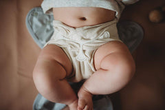 Buttons Diapers Unbleached cotton Birdseye flat, natural fibers suitable for gentle everyday tasks.