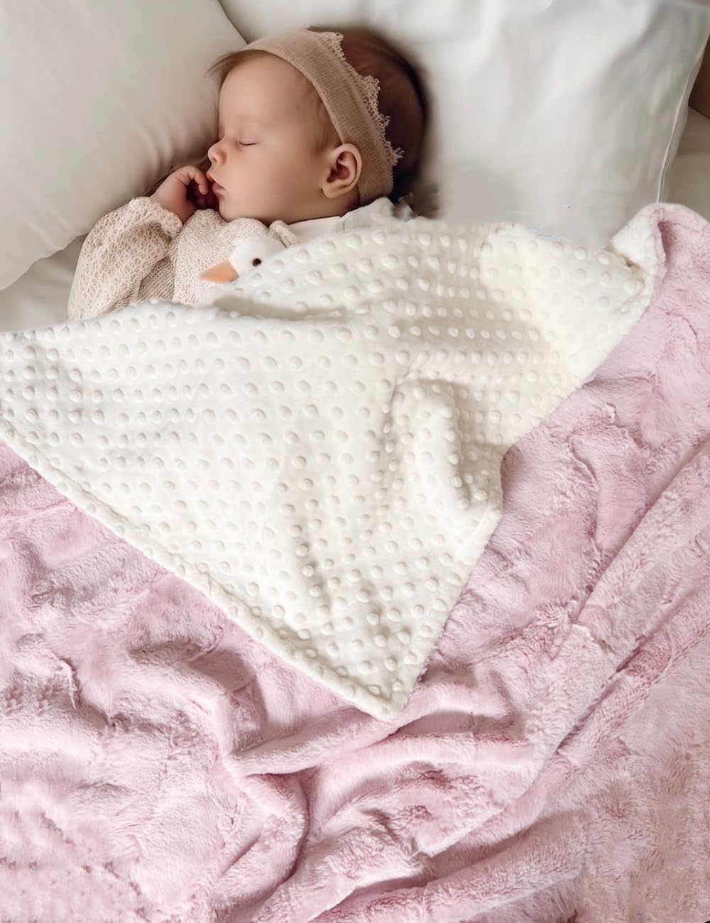 Buttzo blanket used as nursing cover and burp cloth in a cozy moment.