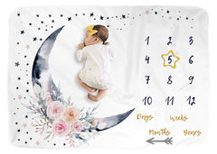 BUTTZO Floral Moon milestone blanket shows monthly growth with arrow markers in plush fleece.