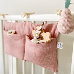 BxuanW two-pocket organizer keeps pacifiers, teethers, and small essentials close