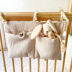BxuanW natural linen bedside organizer adds a soft touch to nursery décor