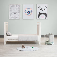 Byrd & Blume Organic Cotton Play Mat folded for compact storage and travel.