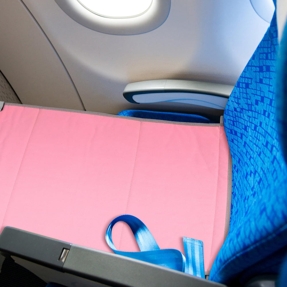 Cabilock toddler-friendly extender in use on plane helping families travel.