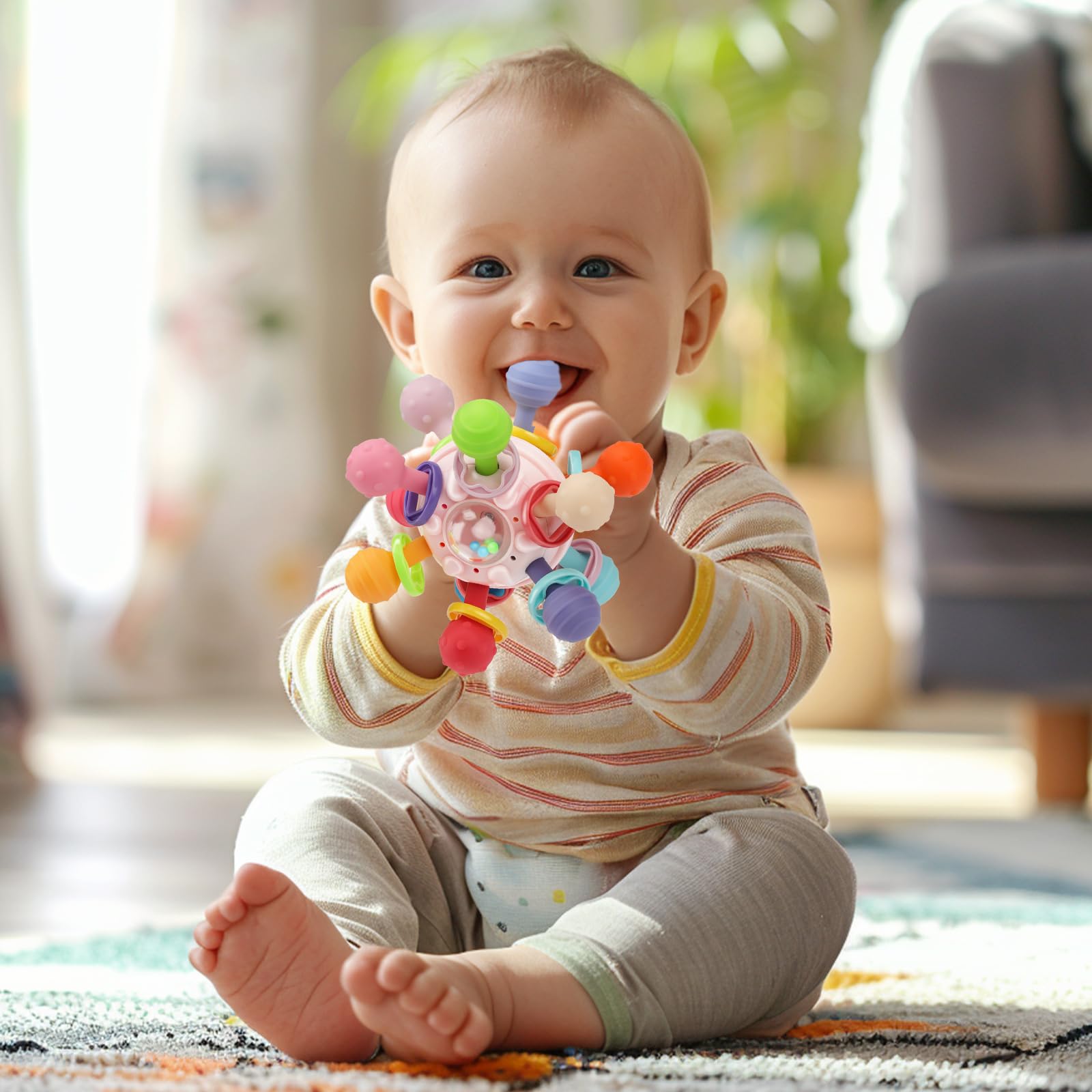 CAHILON teether with rattle ring provides sensory engagement.