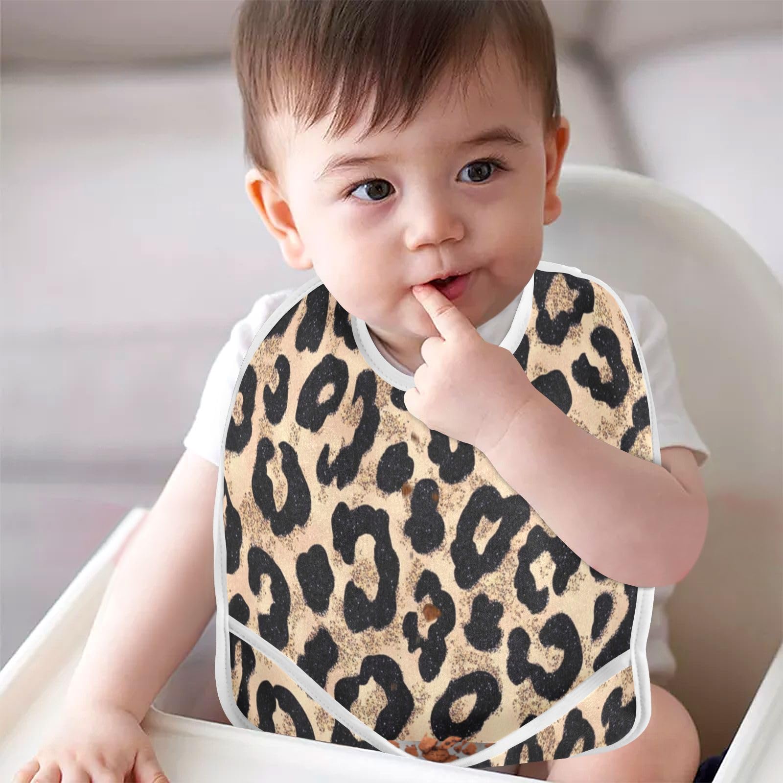 Caikeny baby bib with three adjustable snaps for growing toddlers.