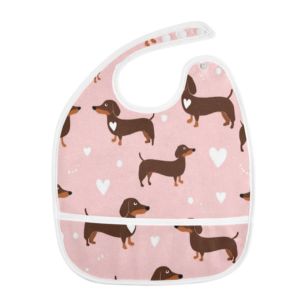 Caikeny bib with pocket catcher to prevent spills from reaching the floor.