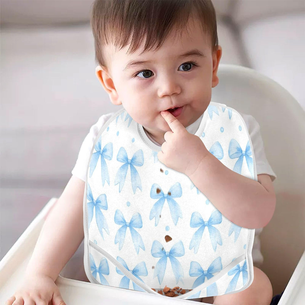 Caikeny two-pack worn by a toddler at mealtime