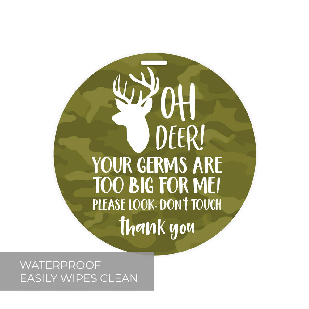 Canopy Street camo deer stop tag on crib for gentle notice about boundaries.
