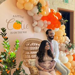 CANTLY A Little Cutie Is On The Way wall sticker adds festive orange vibes.