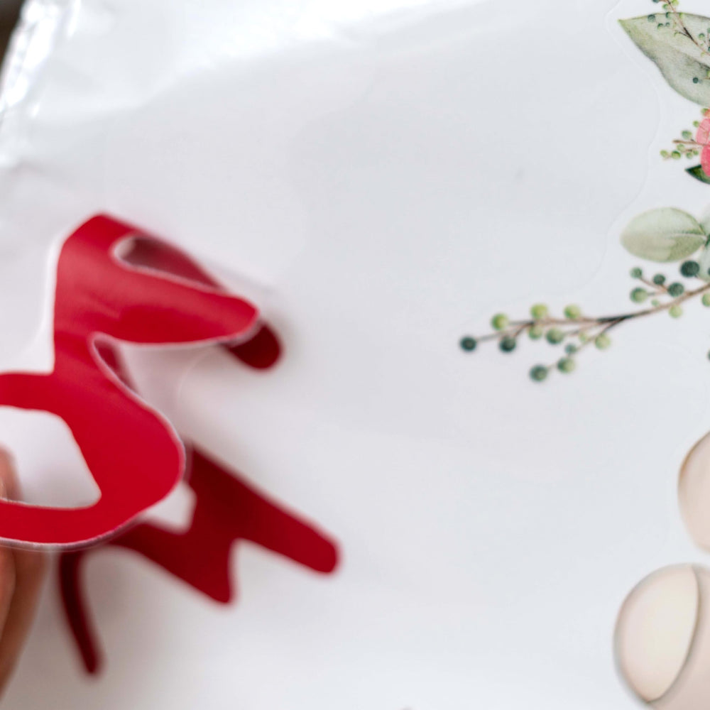 Cantly red lettering adds a bold, elegant touch to celebrations.