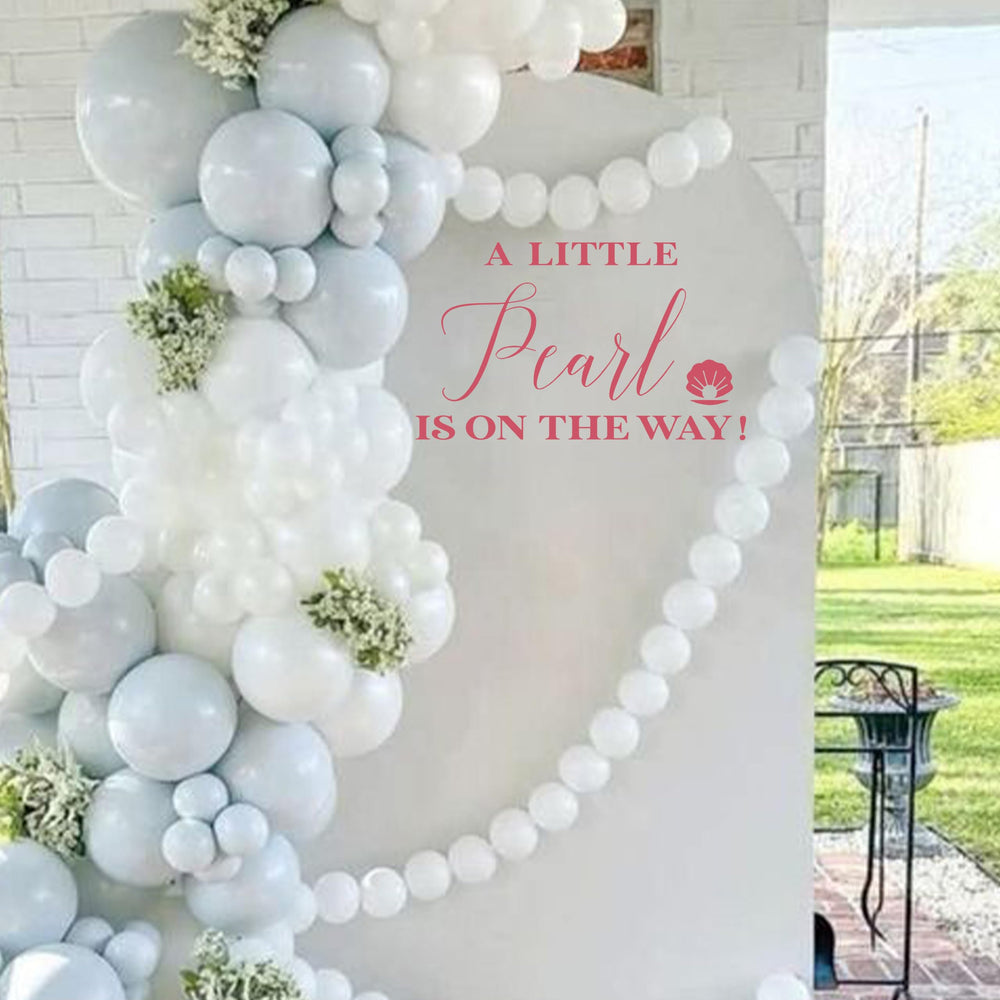 Capiont A Little Pearl burgundy script adds refined party signage