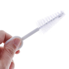 Caralin nipple brush on its hoop for convenient storage.