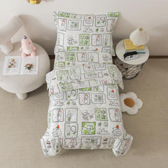 Caressma fitted sheet in green animals, secure fit with deep pockets