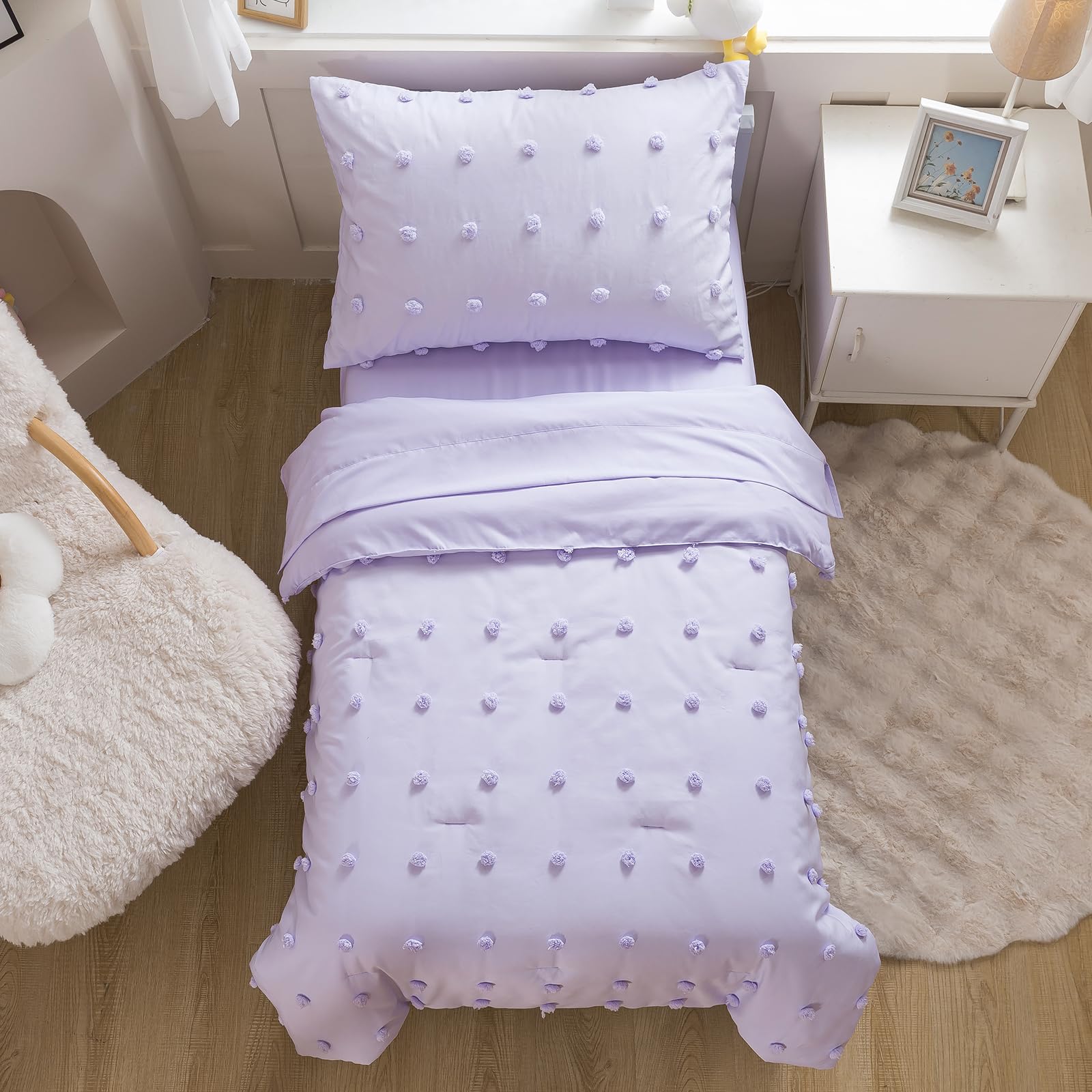 Caressma lavender pillowcase protects pillows and coordinates bedside decor.