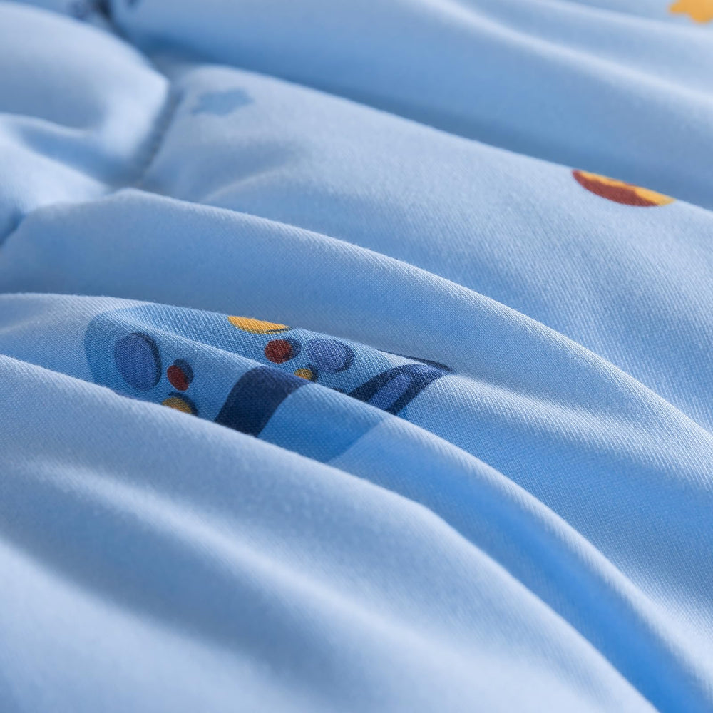 Caressma soft-brushed microfiber texture provides smooth comfort across seasons.