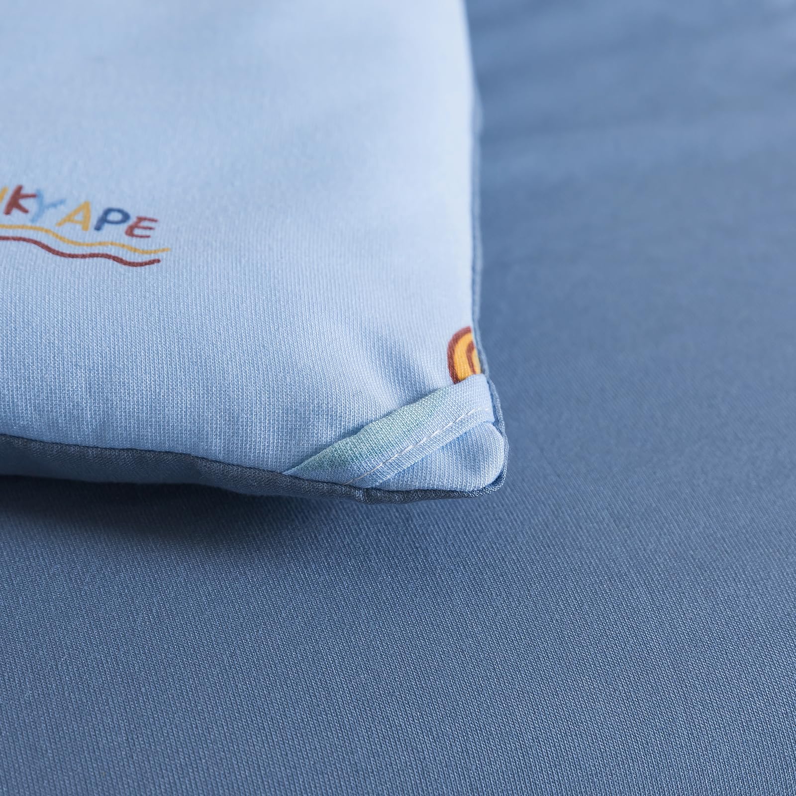 Caressma space-pattern-detail highlights vivid print to spark imaginative bedtime stories.