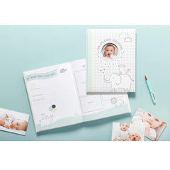 Carter's Our Greatest Adventure memory book pages opened reveal guided prompts for memories