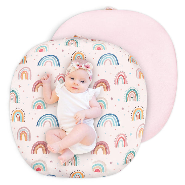 CARUILI newborn lounger cover in pink rainbow pattern for gentle baby comfort.