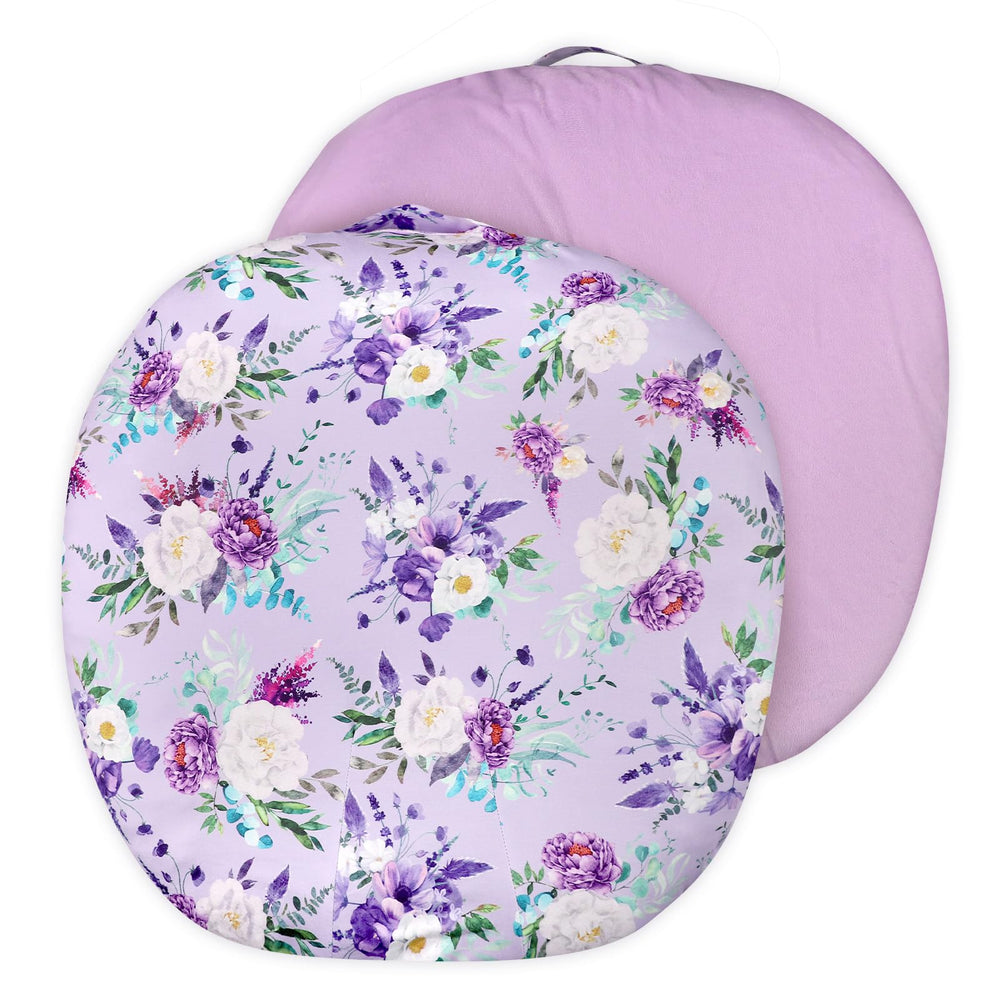 CARUILI newborn lounger cover in purple floral pattern for gentle baby comfort.