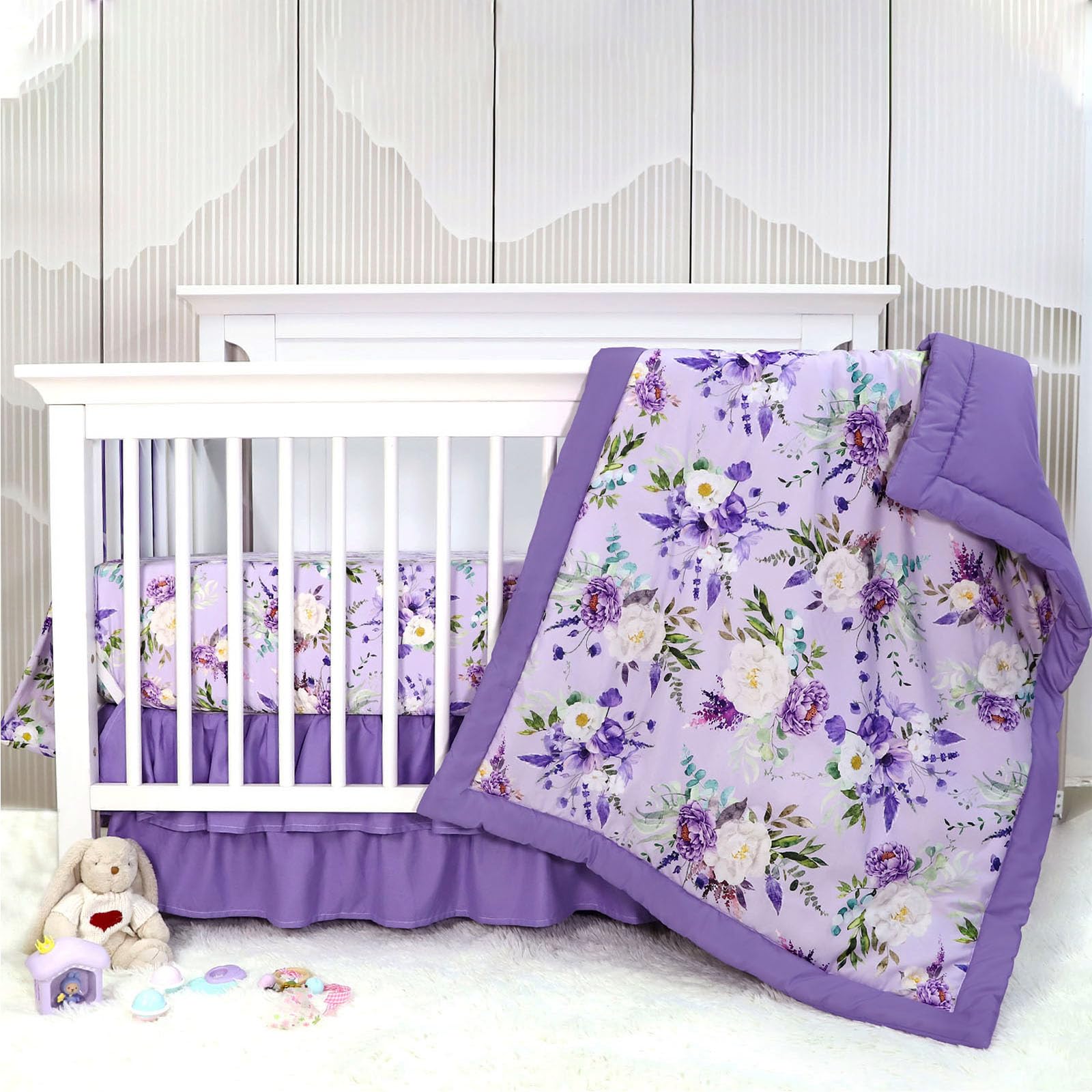 CARUILI purple floral crib comforter close-up highlights breathable cotton warmth and gentle touch.