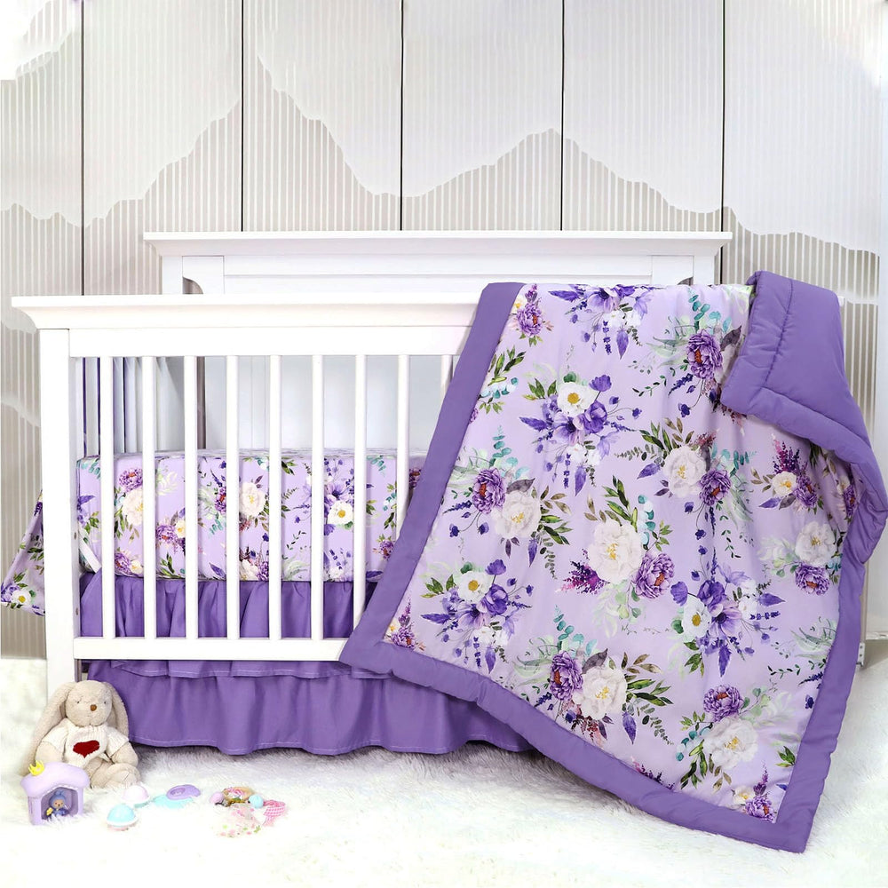 CARUILI purple floral crib comforter close-up highlights breathable cotton warmth and gentle touch.