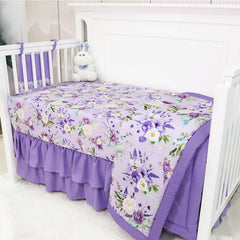 CARUILI fitted crib sheet close-up shows soft microfiber for secure, stretchy fit.