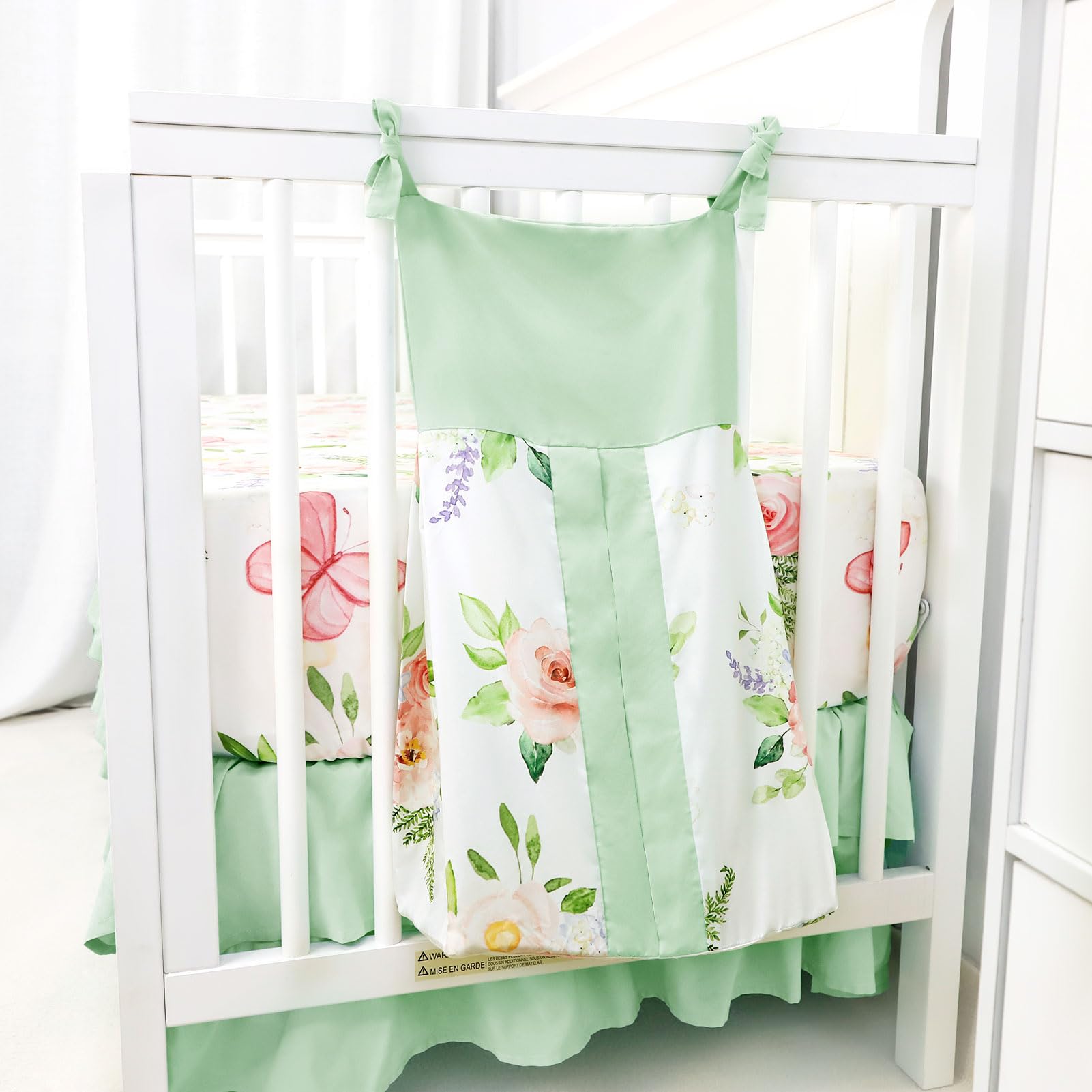 Caruili ruffled crib skirt hides under-bed storage for a tidy nursery