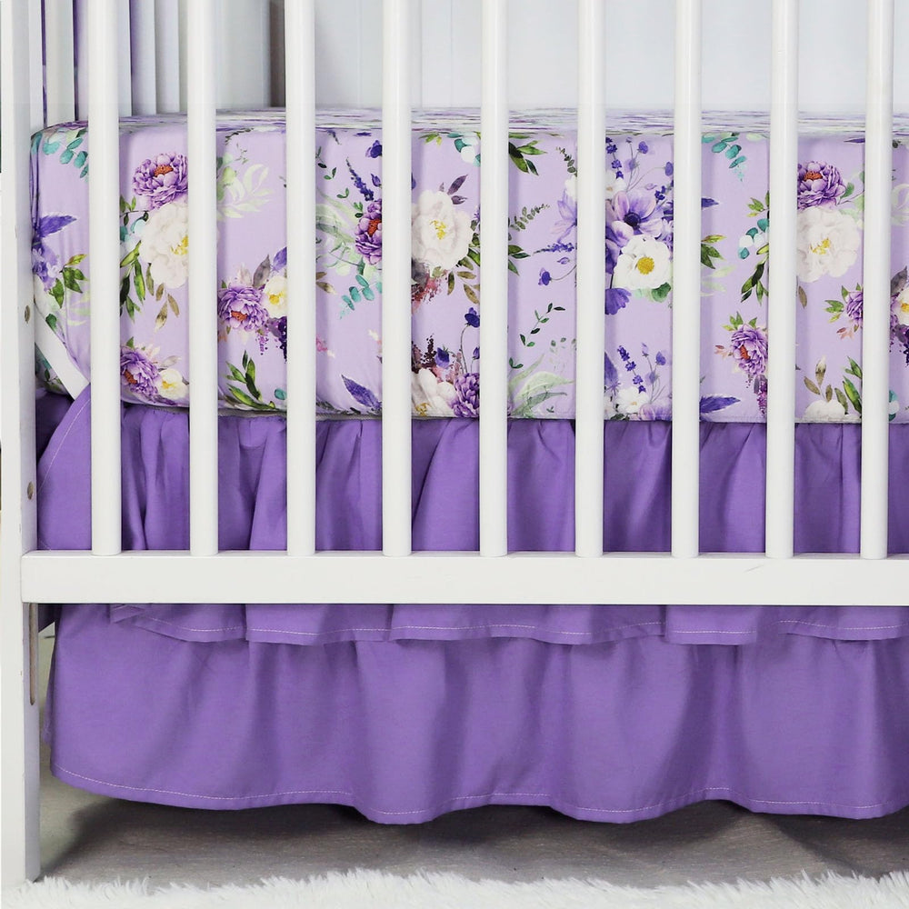 CARUILI ruffled crib skirt detail hides under-crib storage with a neat, decorative edge.