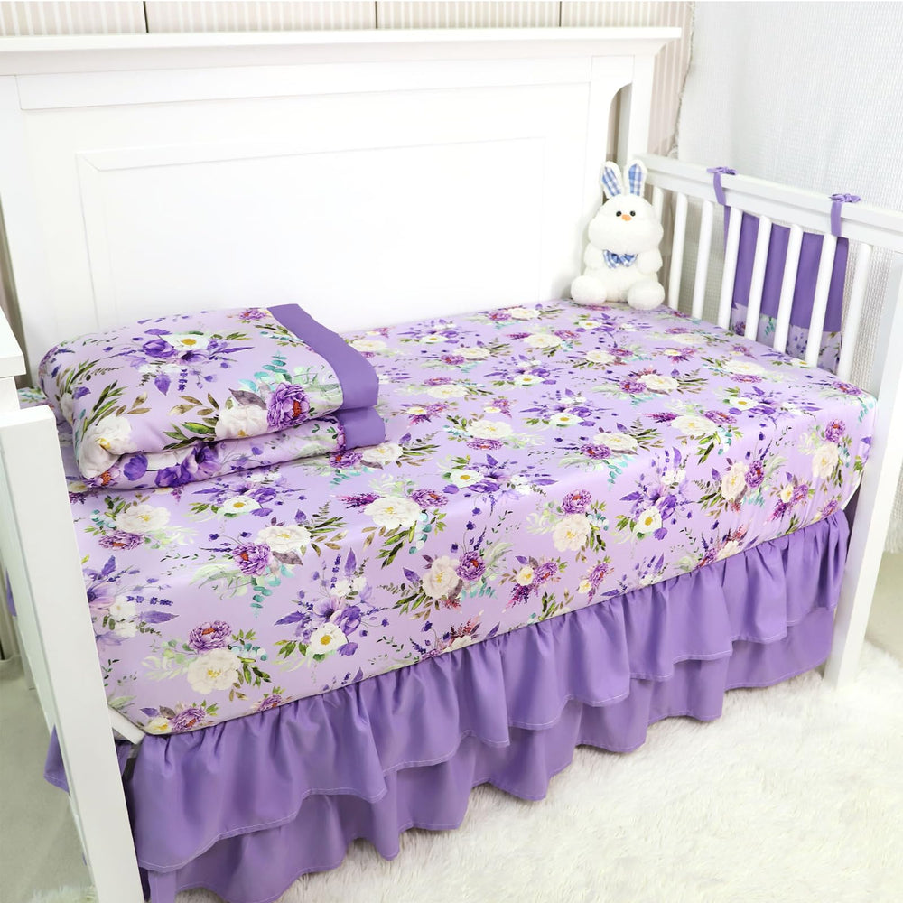 CARUILI nursery scene with purple floral bedding creates a dreamy, coordinated space.