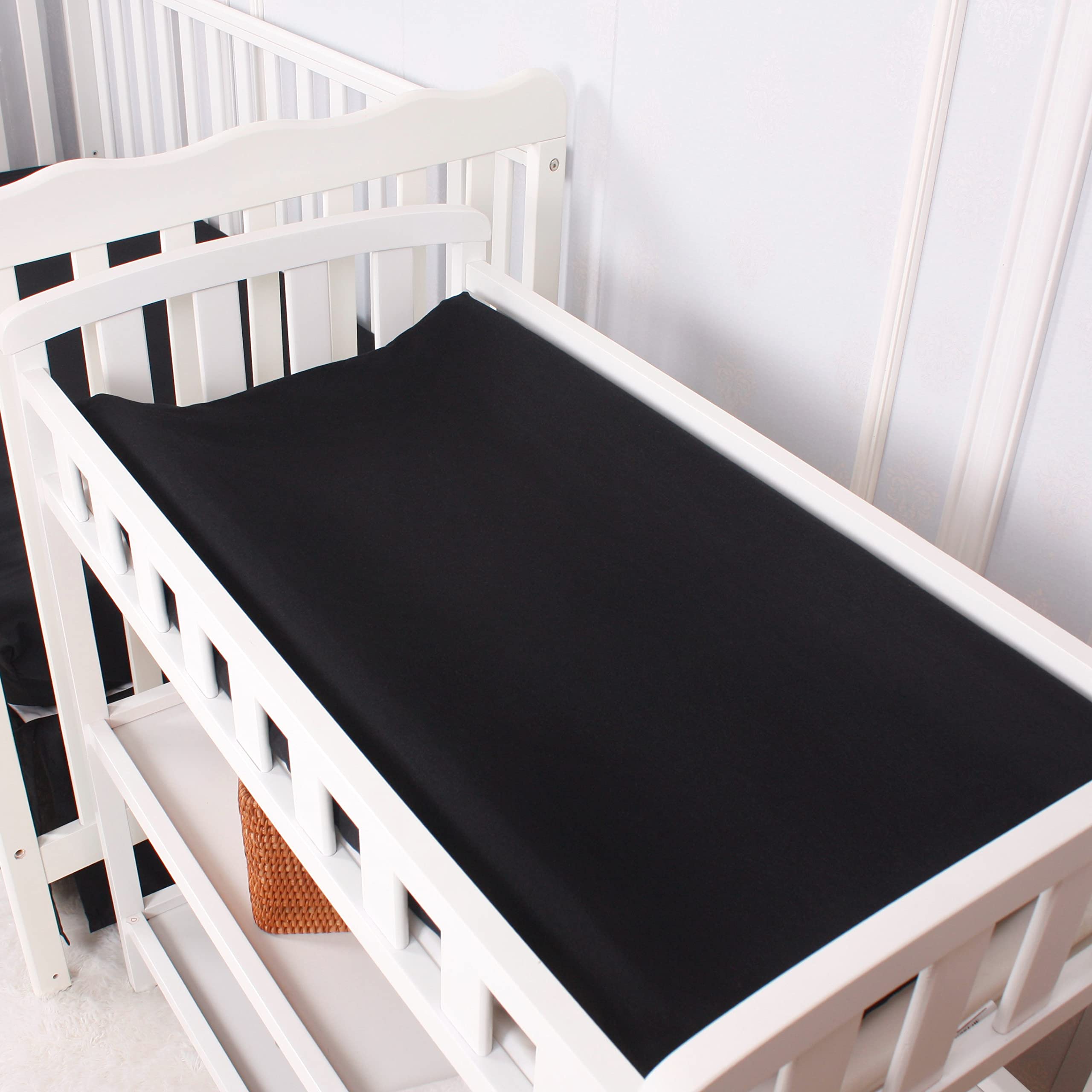 CaSaJa white changing pad cover with 4 sided grip for secure placement