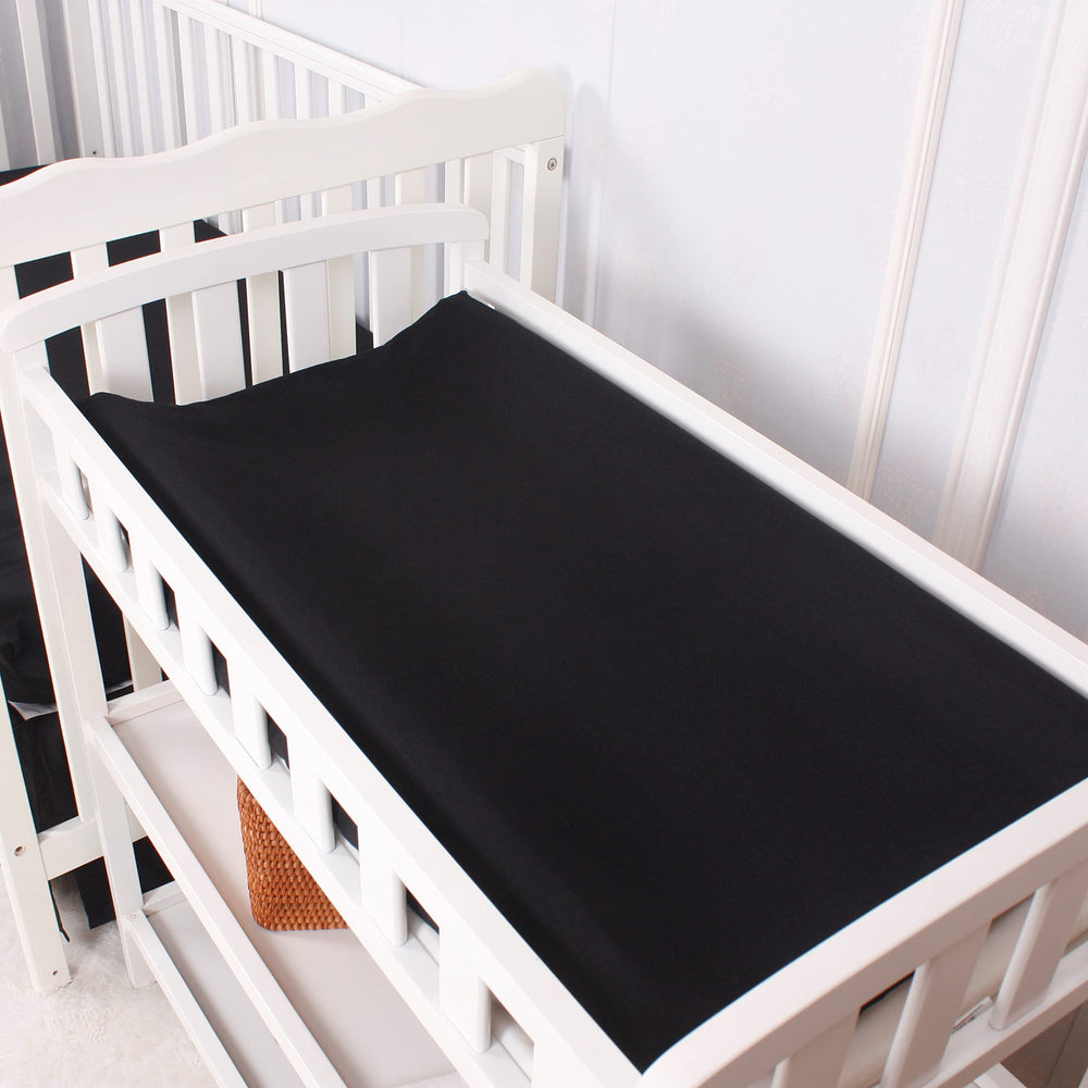 CaSaJa white changing pad cover with 4 sided grip for secure placement