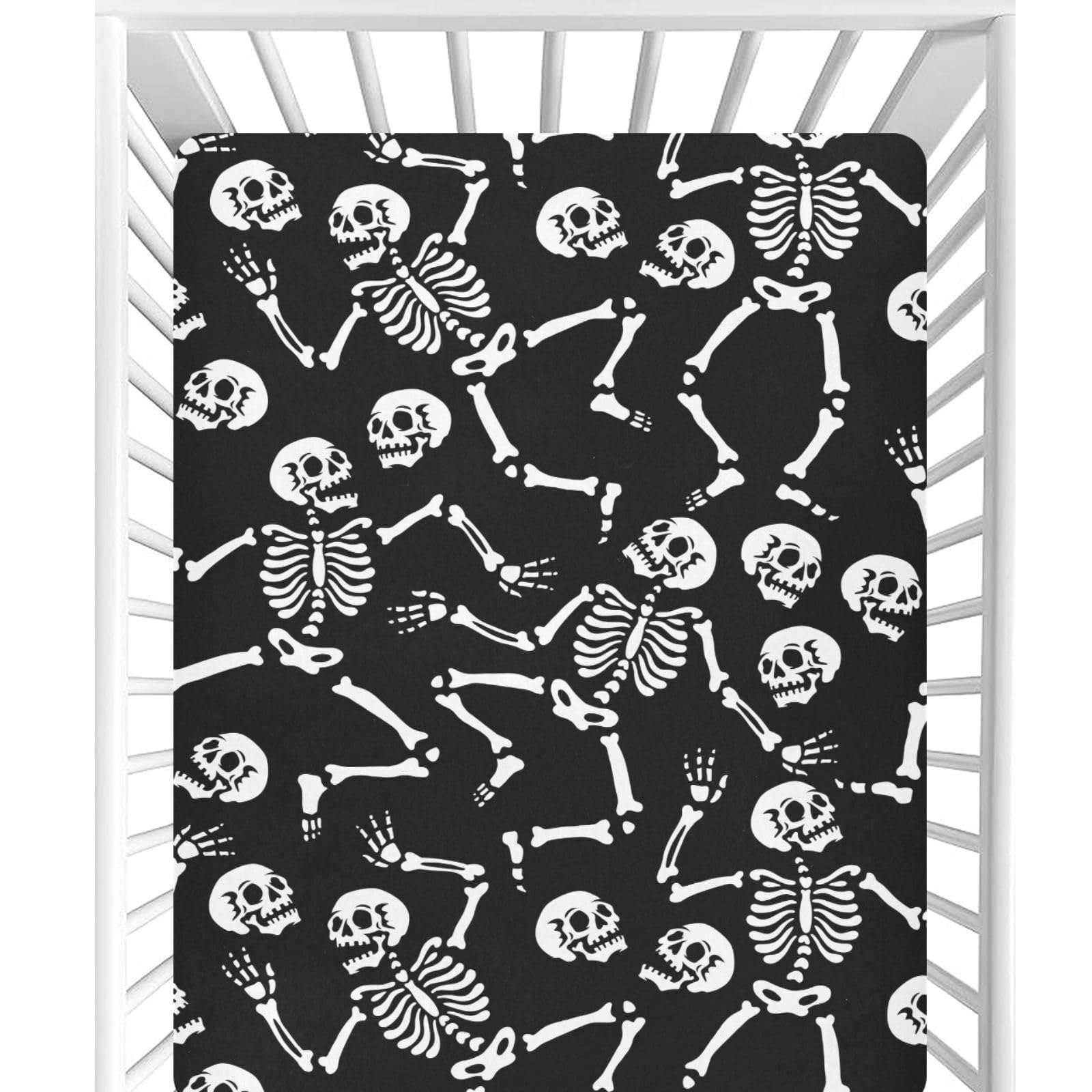 CaTaKu Halloween skull crib sheet close-up showing snug mini crib fit