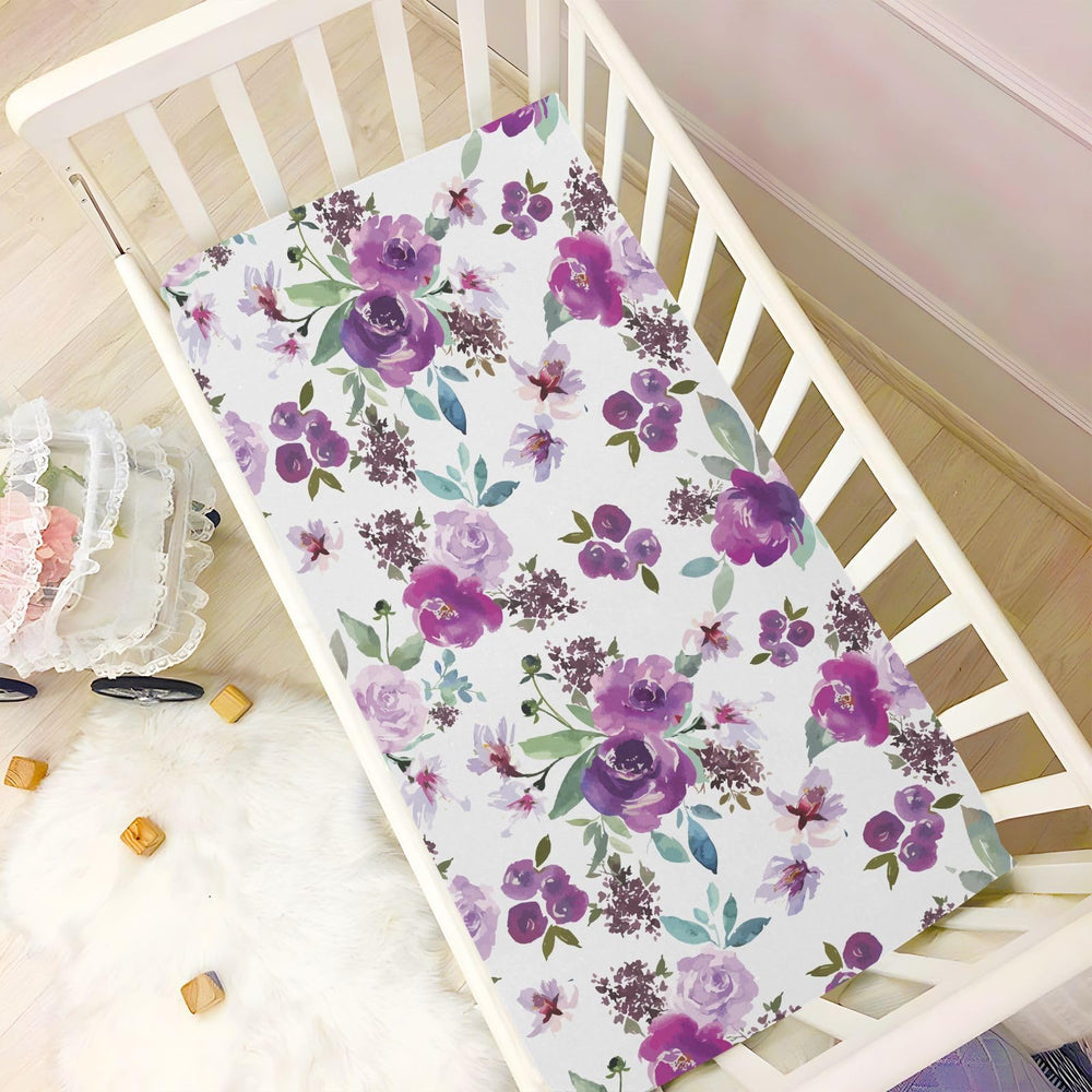 CaTaKu mini crib sheet fits snugly on a 39x27 inch playard