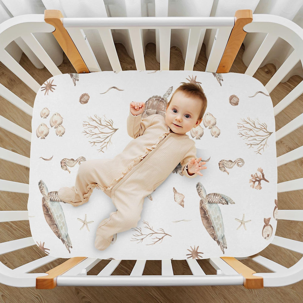 CaTaKu seashells baby sheets offer soft texture for gentle naps.