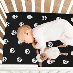 CaTaKu Skull Heads sheet texture highlighting breathable stretch for baby comfort