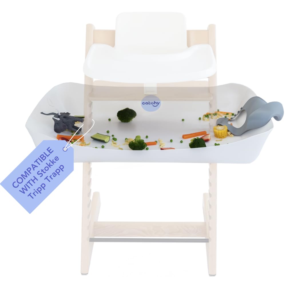 Catchy Food Catcher attached to a Stokke Tripp Trapp high chair for mess-free meals.