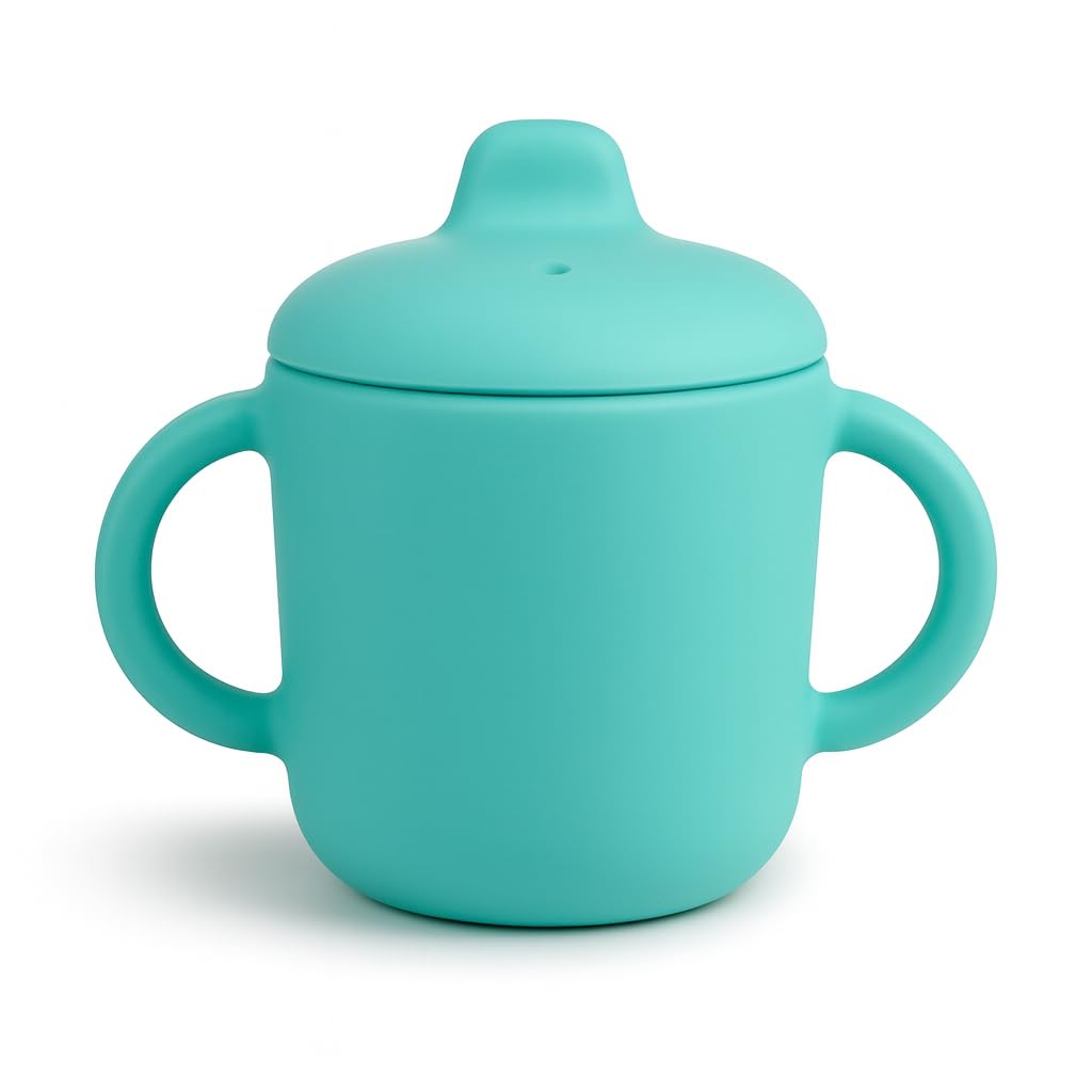 Catii 6 Months+ green-handled sippy cup for easy grip and learning.