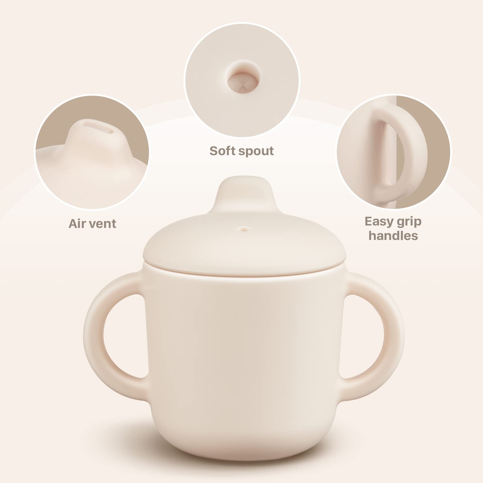 Green Catii cup held by toddler, showcasing easy-grip design for small hands.