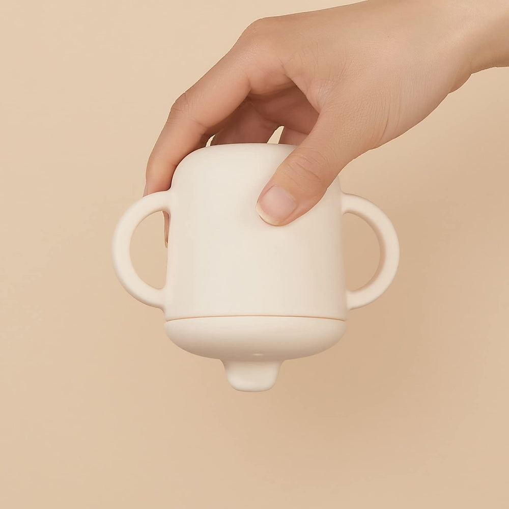 Catii no-spill training cup helps transition to drinking.