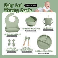 Catvegue green divided plate keeps foods separate for self-feeding.