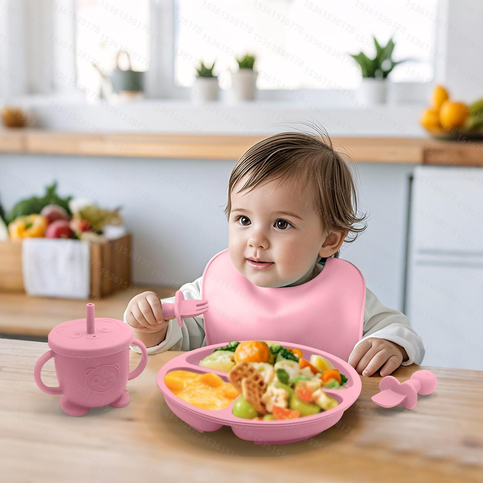 Catvegue pink mini spoon and fork set promotes comfortable grip for little eaters.