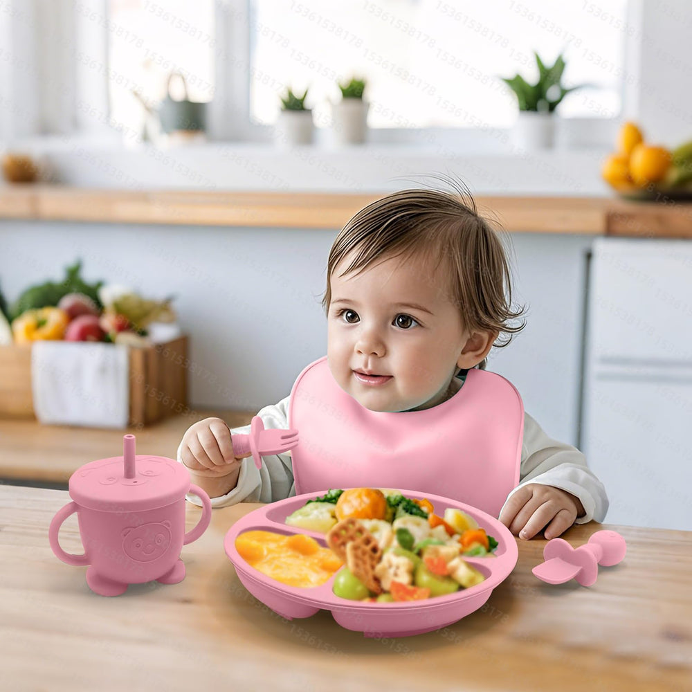 Catvegue pink mini spoon and fork set promotes comfortable grip for little eaters.