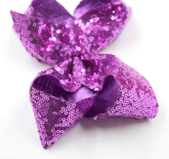 CellElection white sequin bow with clip enhances cute, coordinated looks
